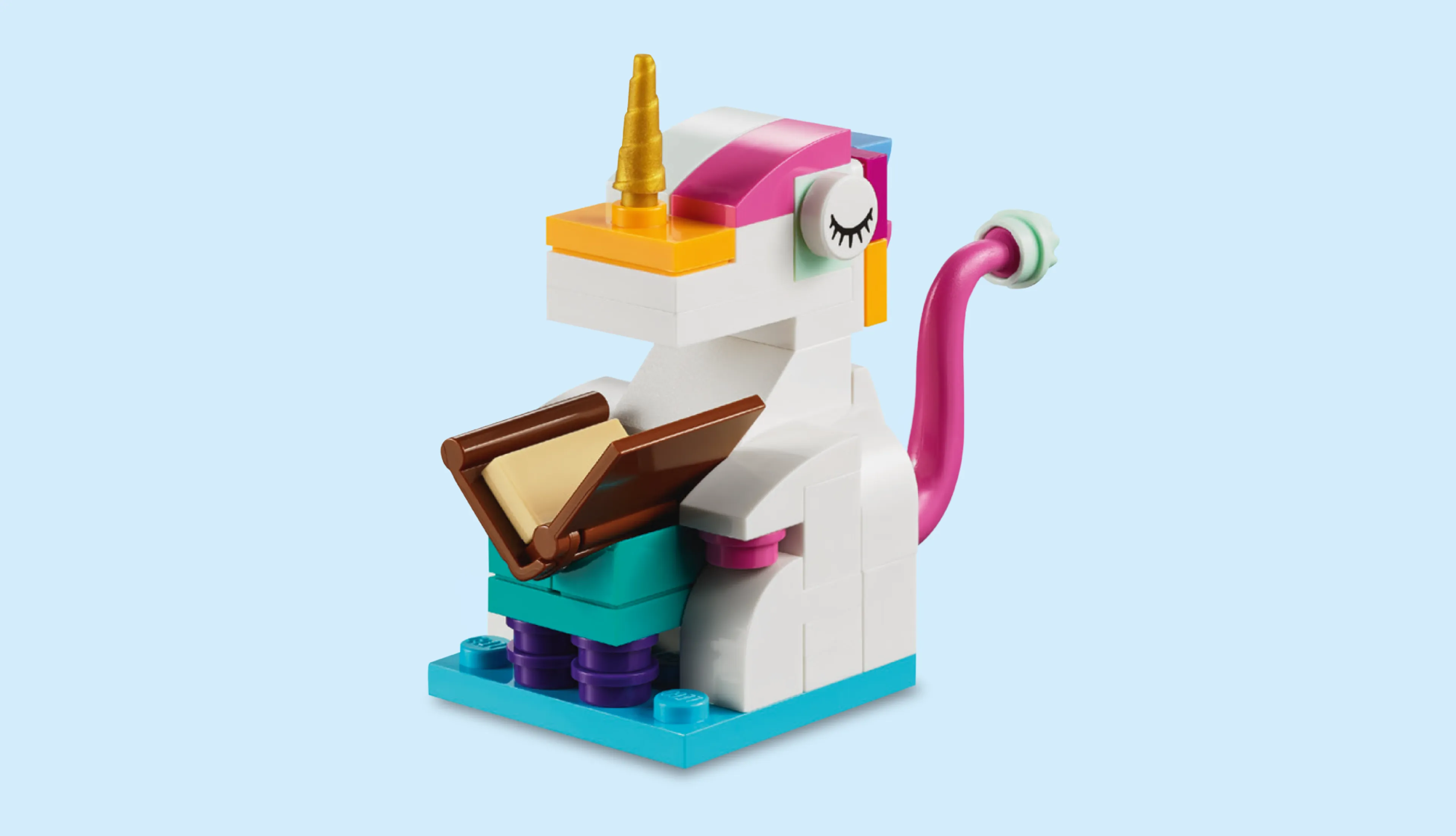 A LEGO unicorn reads a book