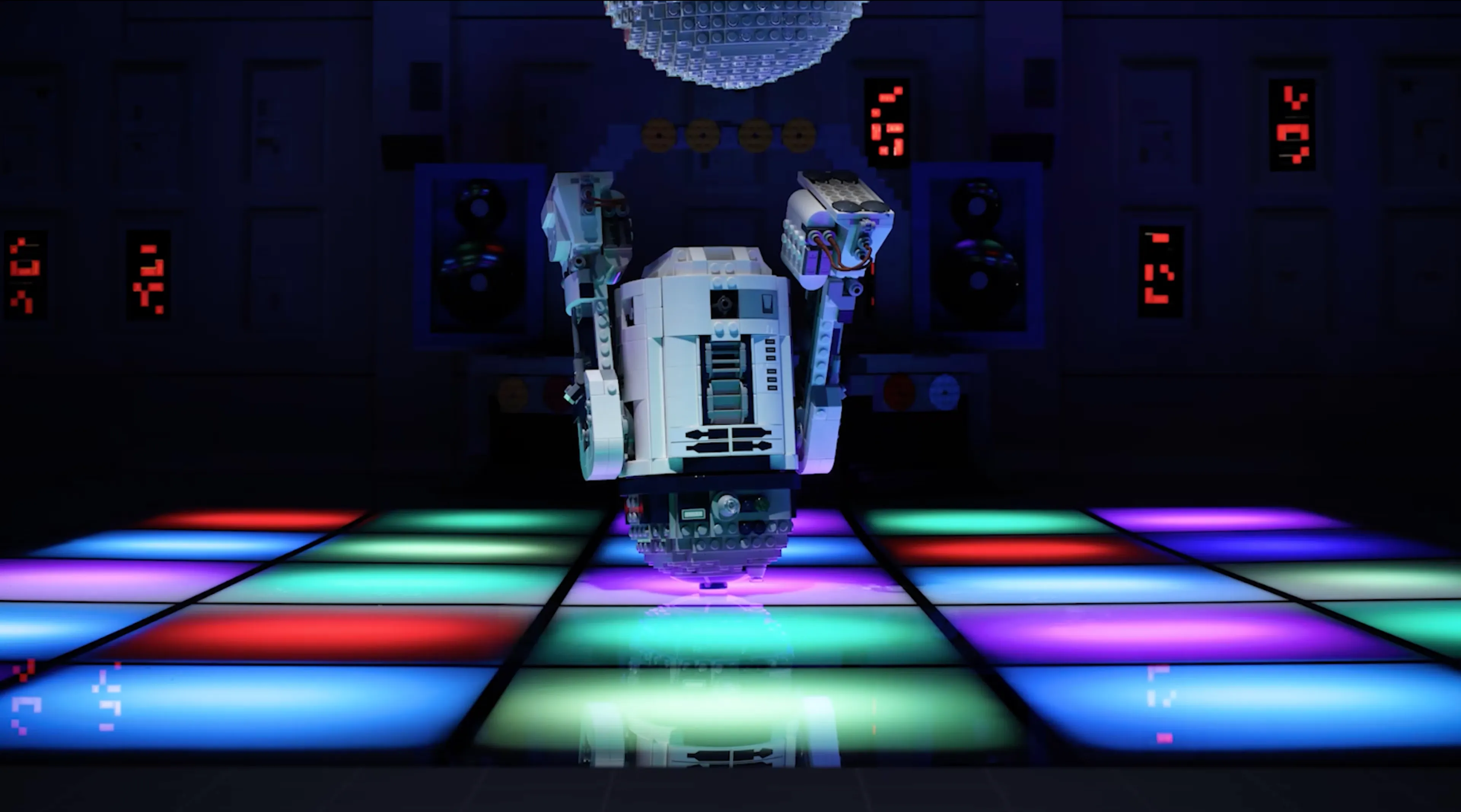 R2-D2 on a dancefloor upside down