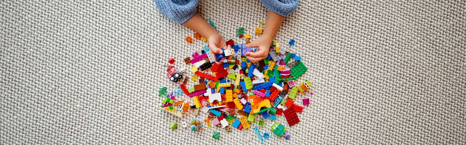 Boy playing with online lego